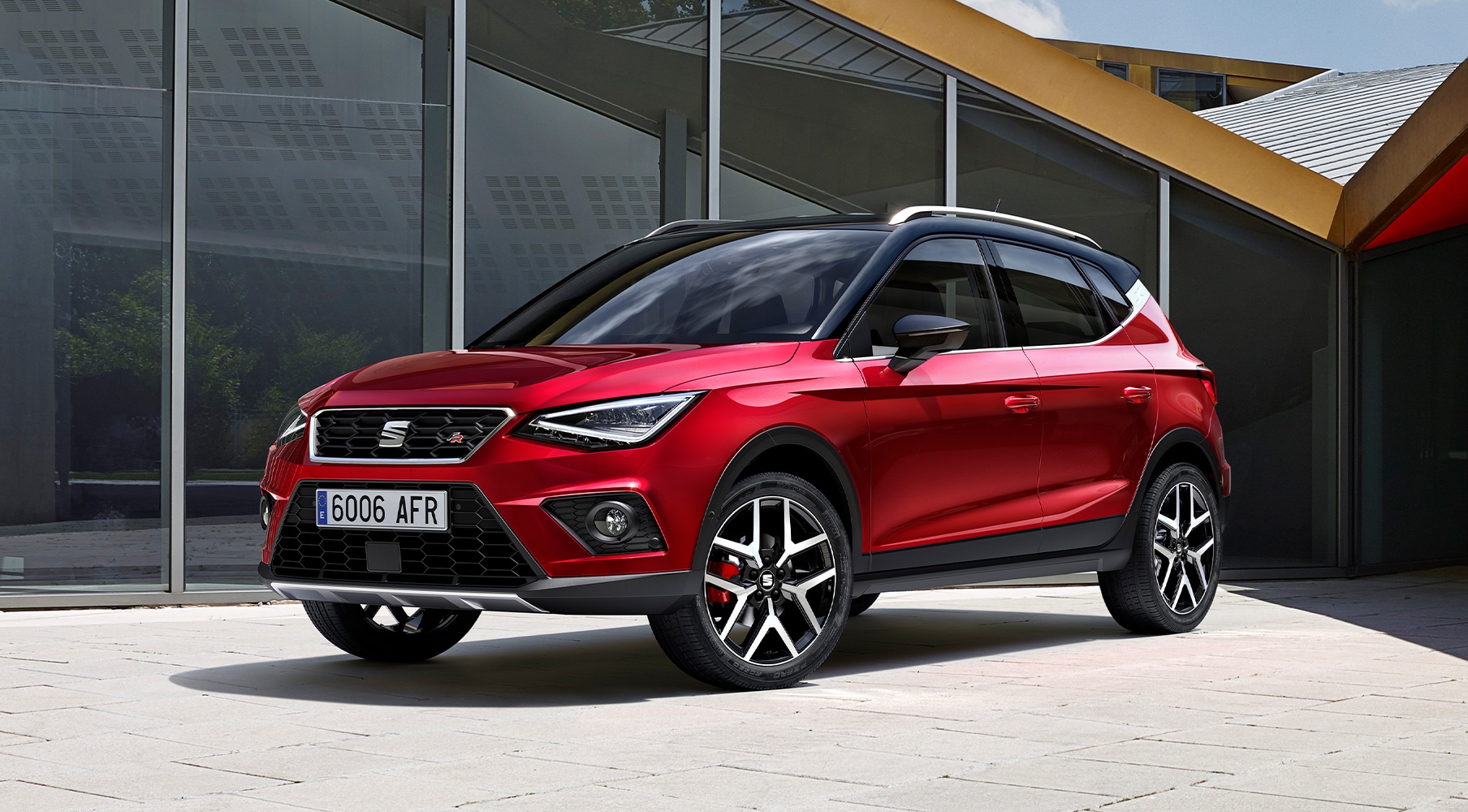 SEAT Arona crossover SUV parked inside modern scene SEAT Arona crossover SUV parked inside modern scene